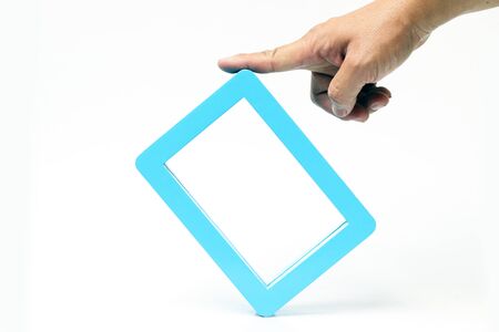 Blue wooden frame on white background.の写真素材