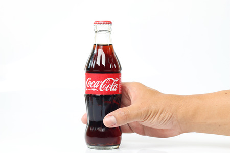 CHIANGMAI, THAILAND- May 5, 2015:Handle Coke , Coca-Cola on white background. Coca-Cola is a carbonated soft drink sold throughout the world.のeditorial素材