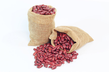 red beans with sack on white backgroundの写真素材