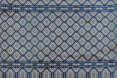 Colorful Thailand style rug surface close up vintage fabric is made of hand-woven cotton fabric