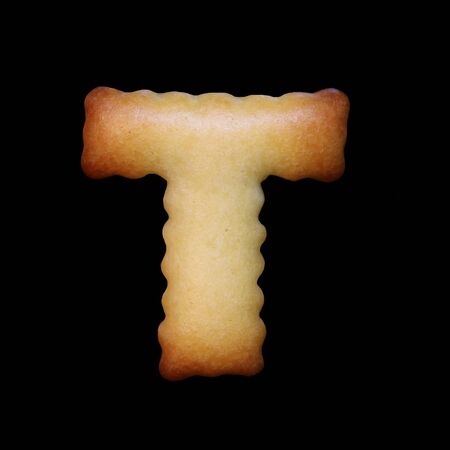 Bread sample letter T on black background.の写真素材