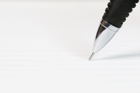 Notebook and pencil. Photo closeup