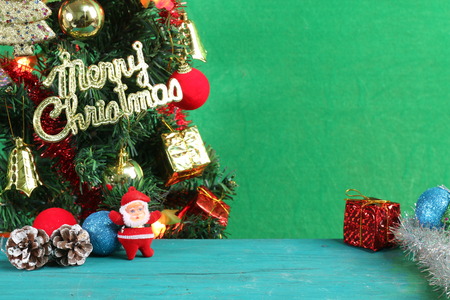 Christmas trees on a green background.の写真素材