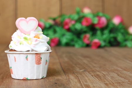 Cupcakes on the wooden floorの写真素材