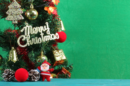 Christmas trees on a green background.の写真素材