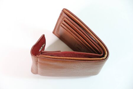 Brown wallet on a white background.