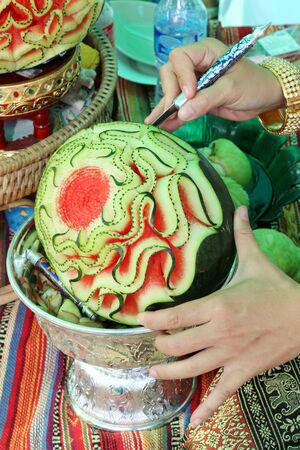 Women are melon carving pattern Thailand.の写真素材
