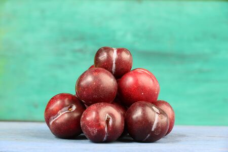 Ripe nectarines on old wooden blue.の写真素材