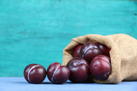 Ripe nectarines on old wooden blue.の写真素材