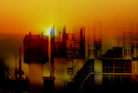 Double exposure building Construction with Crane, sunset blurの写真素材
