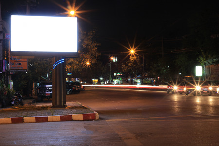 Blank billboard at night time for advertisement city street night lightの写真素材