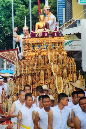 CHIANG MAI THAILAND -May 22,2017 : Procession Buddha,Inthakhin traditional Offerings of flowers.An unidentified women are offerings flowers to the traditional city pillar shrine in Chiangmai Thailandのeditorial素材