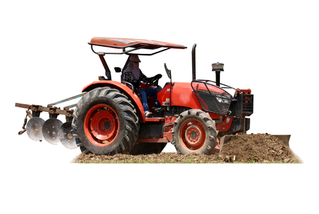 Tractor ploughing a field  isolated on white, with clipping path.の写真素材