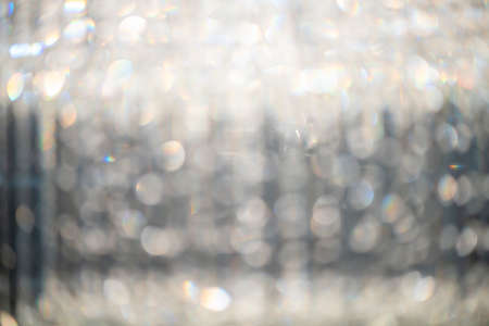 Abstract bokeh lights with soft light background, Bokeh blurred of Chrystal chandelierの写真素材