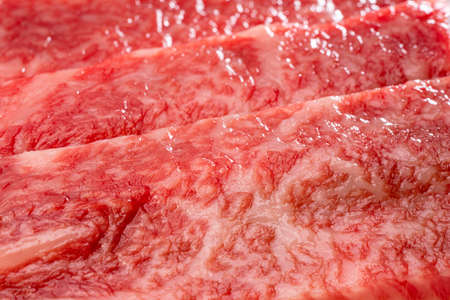 Fresh Premium Rare Slices Wagyu beef with marbled texture.の写真素材