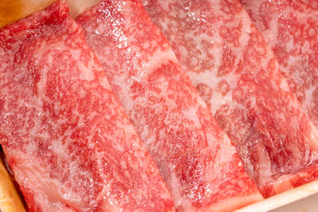 Fresh Premium Rare Slices Wagyu beef with marbled texture.の写真素材