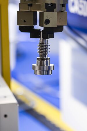 Robotic programmed robot arm. Industrial exhibition of machine tools.の写真素材