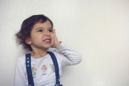 Little girl shows a emotion like "oh no"の写真素材