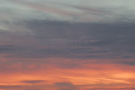 Colorful sunset sky with pink tonesの写真素材