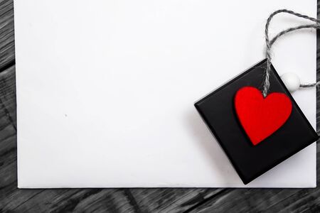 Valentine's day white background, black box with heartsの写真素材