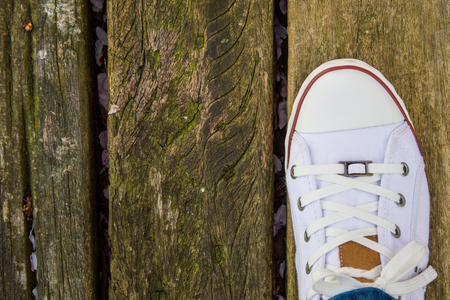 new white macas stand on a wooden backgroundの写真素材