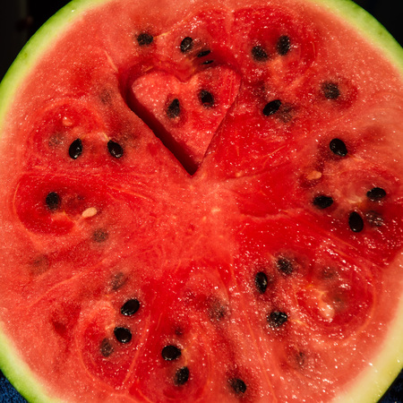 Watermelon background with heart, concept love of veganismの写真素材