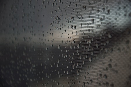 small drops of water on the glass, the concept of rainy weatherの写真素材