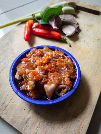 Indonesian Food squid with terasi sauce. (Cumi sambal terasi), made from squid with indonesian sauce or sambal with the name of terasi sauce (sambal terasi).の写真素材