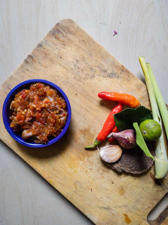 Indonesian Food squid with terasi sauce. (Cumi sambal terasi), made from squid with indonesian sauce or sambal with the name of terasi sauce (sambal terasi).の写真素材