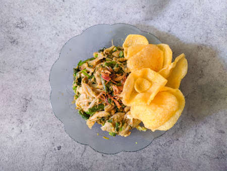 Traditional Indonesian Salad Food. Lotek Or Gado Gado. various kind of Vegetable with Peanut Sauce and crackers (Kerupuk)の写真素材