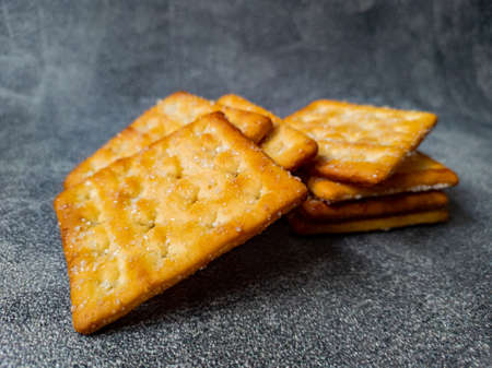 Close Up Sweet Crunchy Crackers isolated on abstract background.の写真素材