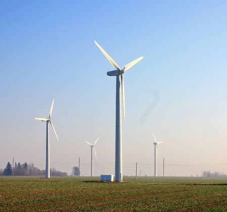 wind farmindustrial wind power plant in the field in fieldの写真素材
