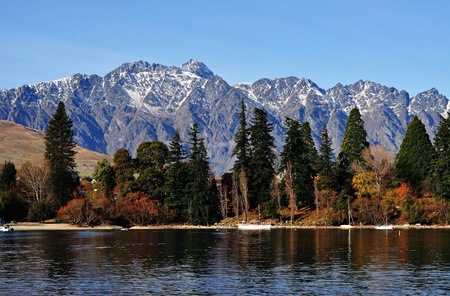 View of The Remarkables Mountain Range and lake Wakatipu in Queenstownの写真素材