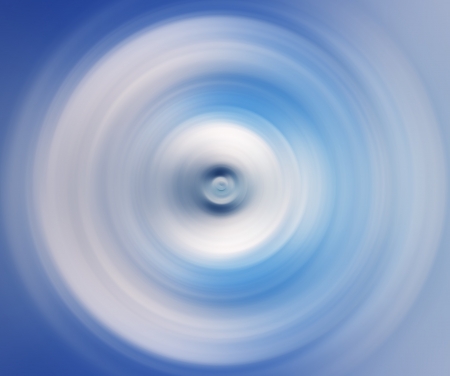 Abstract Swirling ripples blue and white backgroundの写真素材