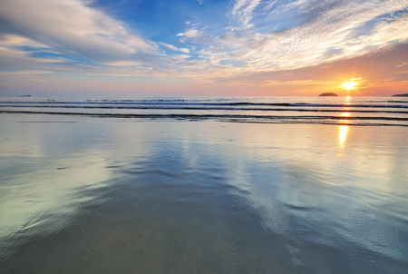 Sunset by the beachの写真素材