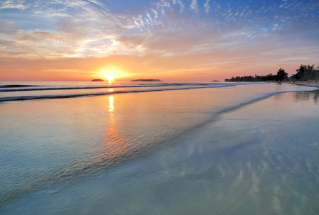 Sunset by the beachの写真素材