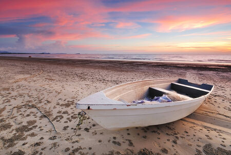 Fishing boat at sunset in Tanjung Au Beach, Kota kinabalu Sabah Malaysiaの写真素材