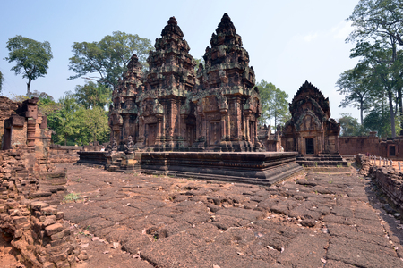 The ruins of the temple Banteay Srei in Angkor Wat, Siem Reap, Cambodia. Banteay Srei is a 10th-century Cambodian temple dedicated to the Hindu god Shiva.の写真素材