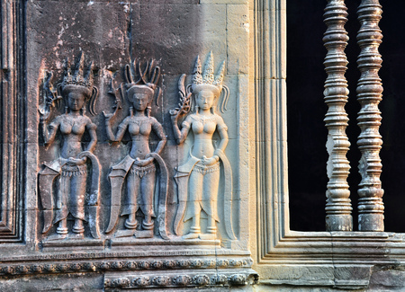 Apsara, a bas relief in Angkor Thom, Angkor Wat Temple Complex near Siem Reap, Cambodia.の写真素材
