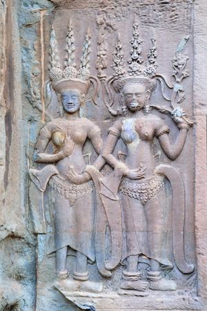 Apsara, a bas relief in Angkor Thom, Angkor Wat Temple Complex near Siem Reap, Cambodia.の写真素材