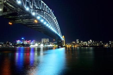 Night scenery of the Sydney city Harbour bridge viewed from Circular Quay, Sydney, Australia.のeditorial素材