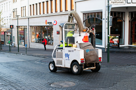 Reykjavik, Iceland - September 22, 2013: Waste vacuum cleaner truck on the street of Reykjavik.のeditorial素材