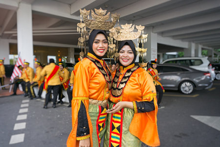 Kota Kinabalu, Malaysia - August 31, 2017: Women from Bajau Sama ethnic from Kota Belud with traditional attire during 60th Independence Day celebration in Kota Kinabalu city, Sabah State.のeditorial素材