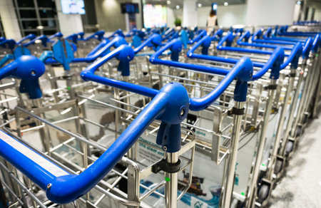 Airport trolley parking lot with empty trolleys.のeditorial素材