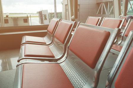 Empty seat at the departure lounge in the airport.のeditorial素材