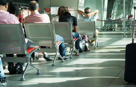 Kota Kinabalu, Malaysia - September 06, 2017: Traveler waiting to board at the departure lounge in Kota Kinabalu International Airport.のeditorial素材