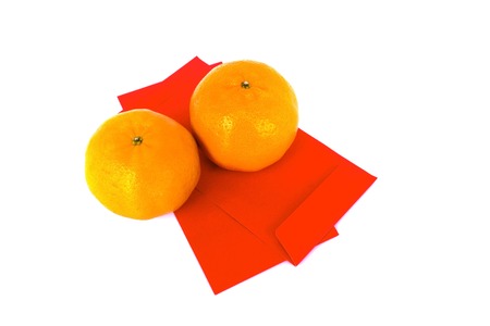 Chinese New Year Background Red Envelope and Mandarin Orange on white background.の写真素材