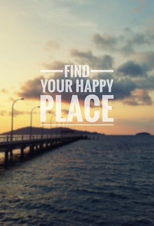 Inspirational quote - Find your happy place . Blurry sunset background.の写真素材