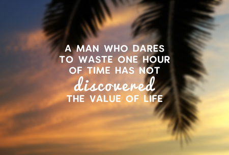 Motivational and inspirational quote - A man who dares to waste one hour of the time has not discovered the value of life.の写真素材