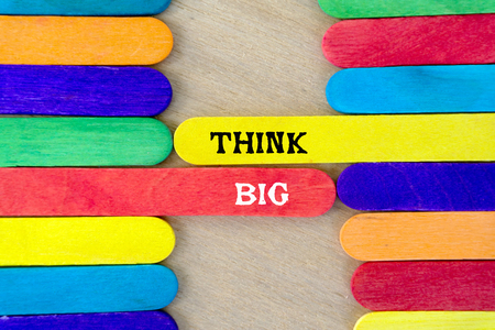 Think big quote on colorful wooden stick - business conceptualの写真素材